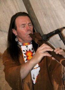native American playing musical instrument